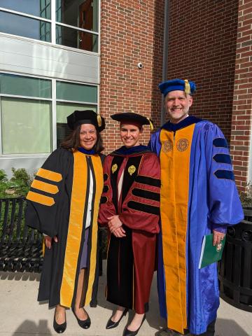 faculty in commencement regalia