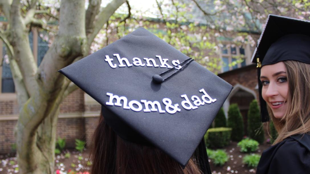 Graduation cap with "Thanks Mom & Dad" message.
