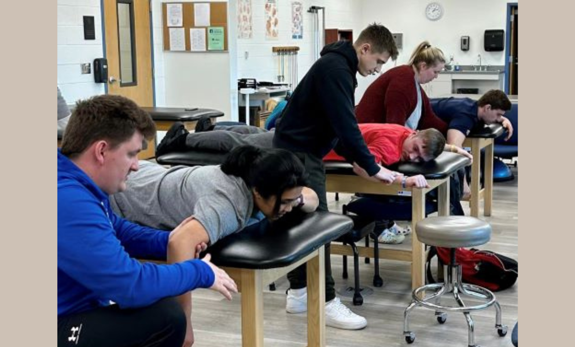 PTA students practice skills in a lab setting