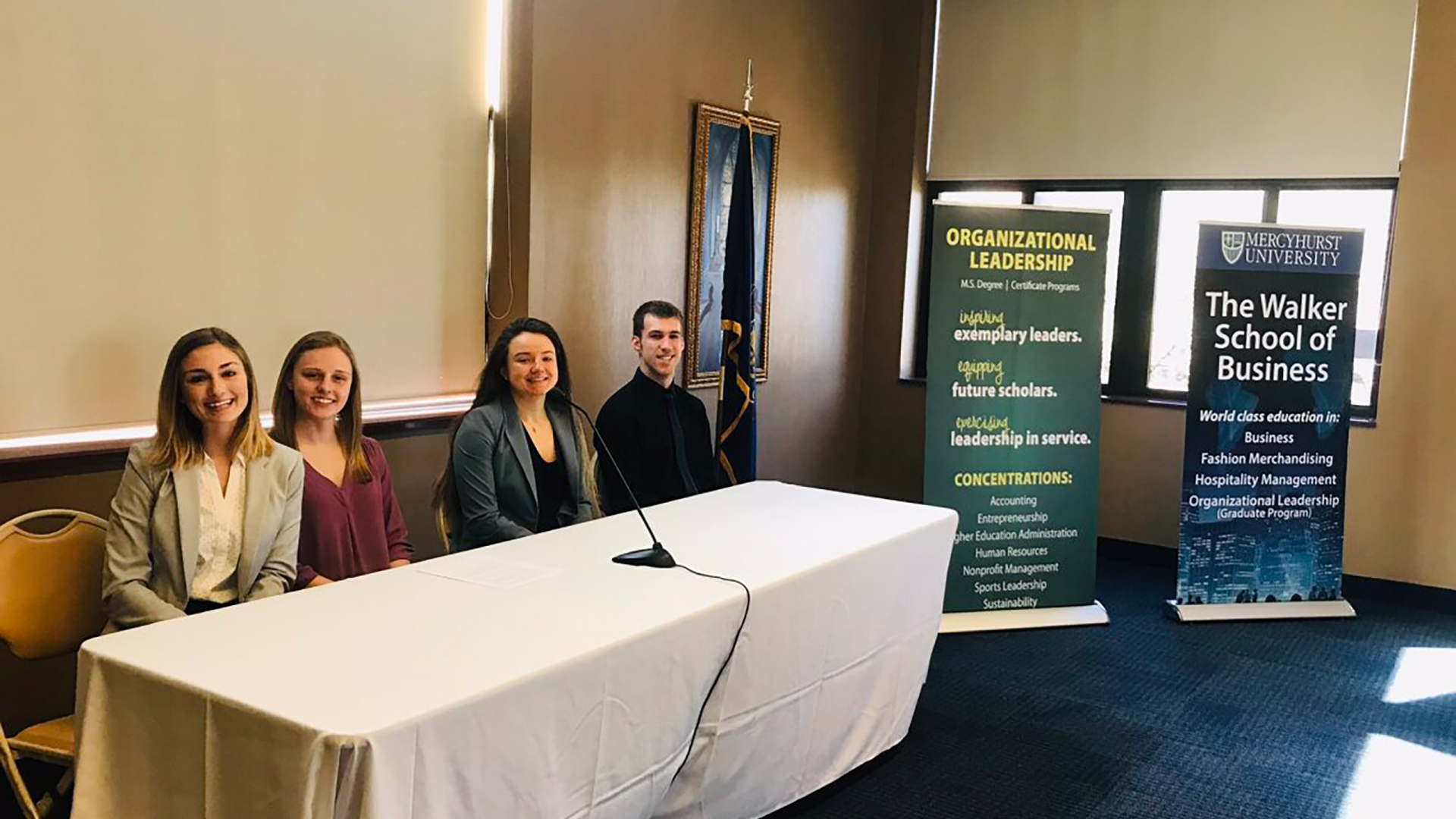 Business students giving a presentation