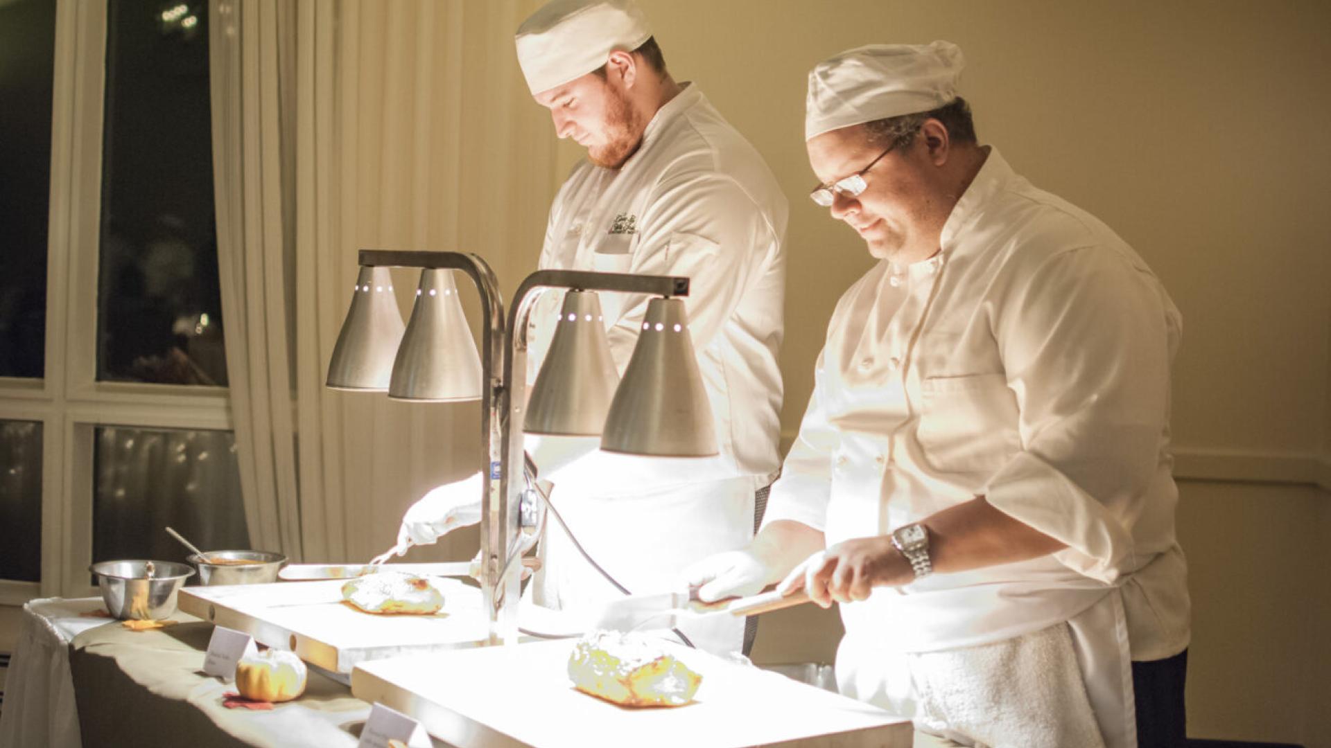 Culinary Arts students cooking for event