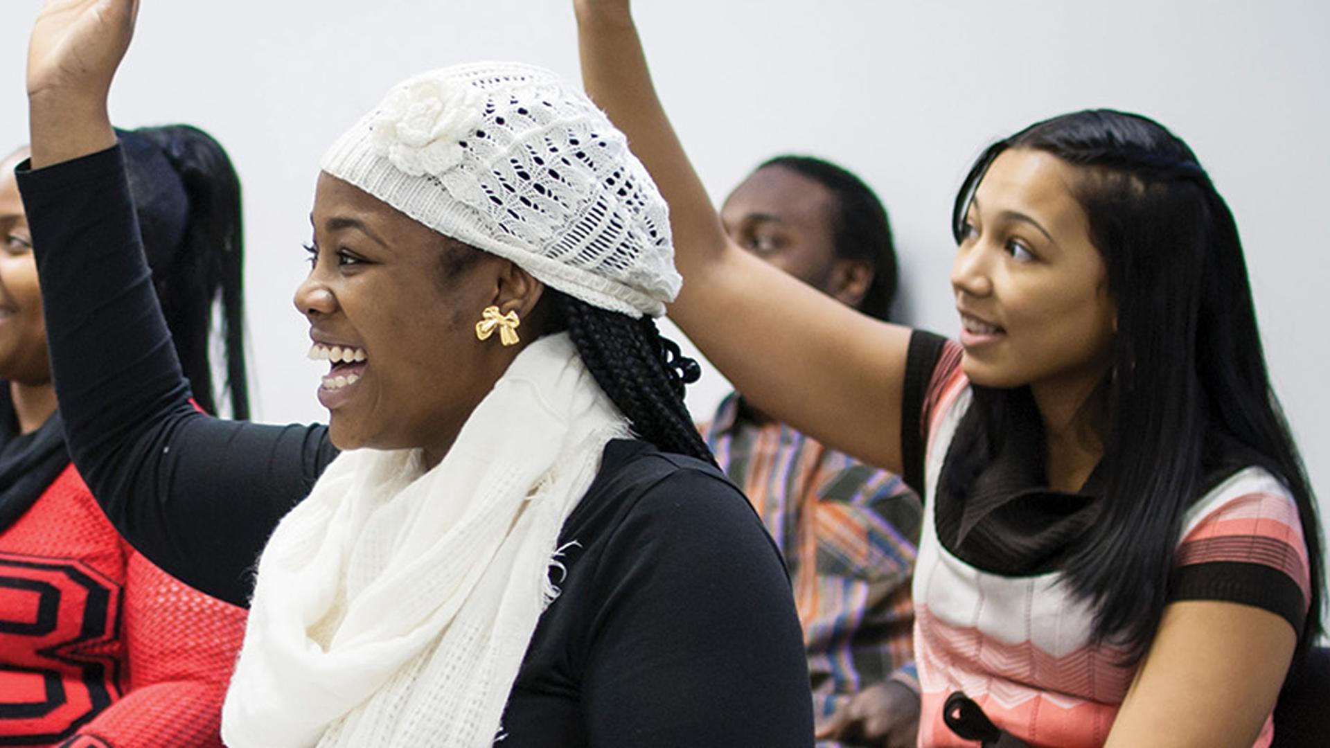 Adult Students participating in class