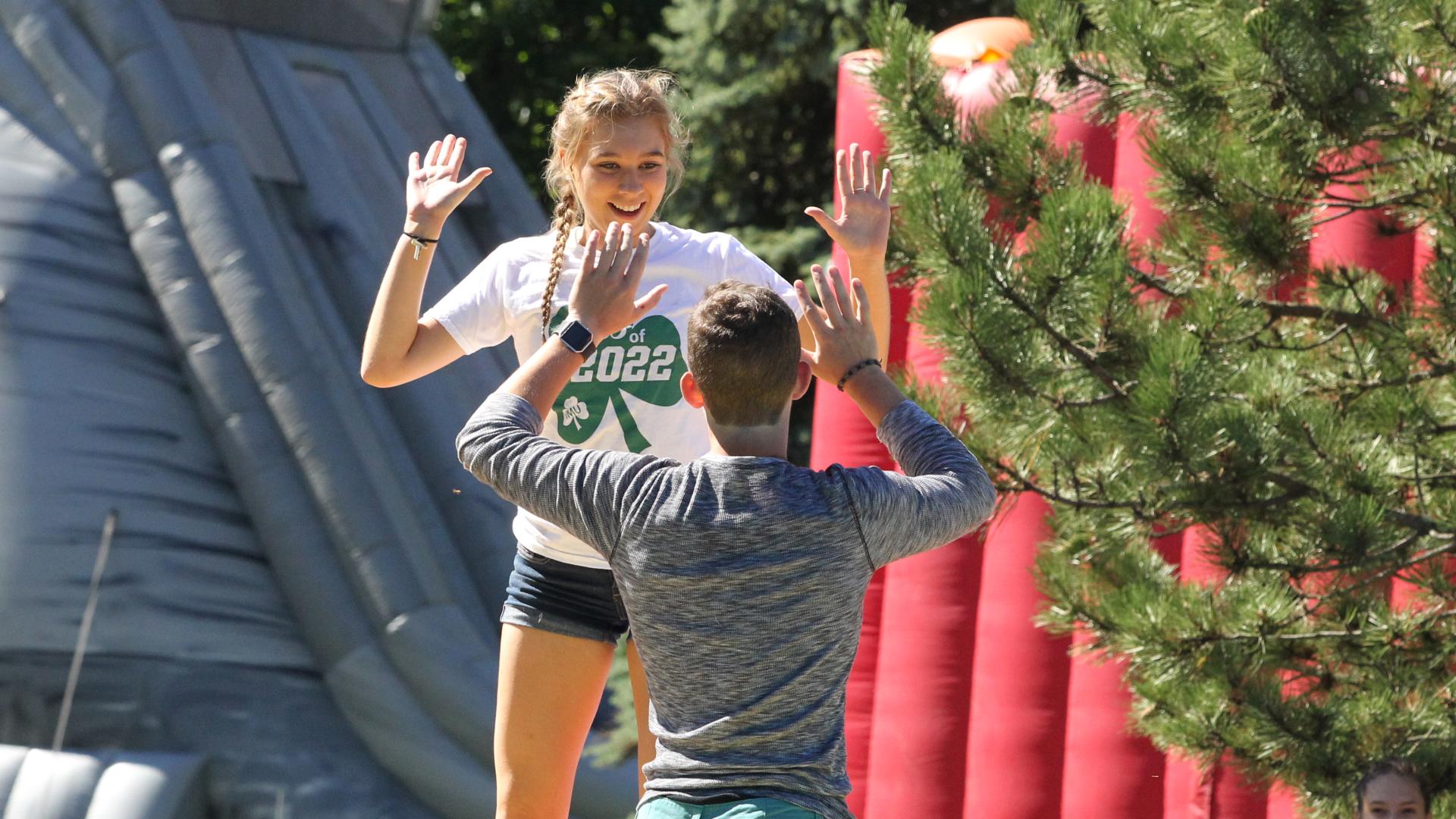 Students giving a high five