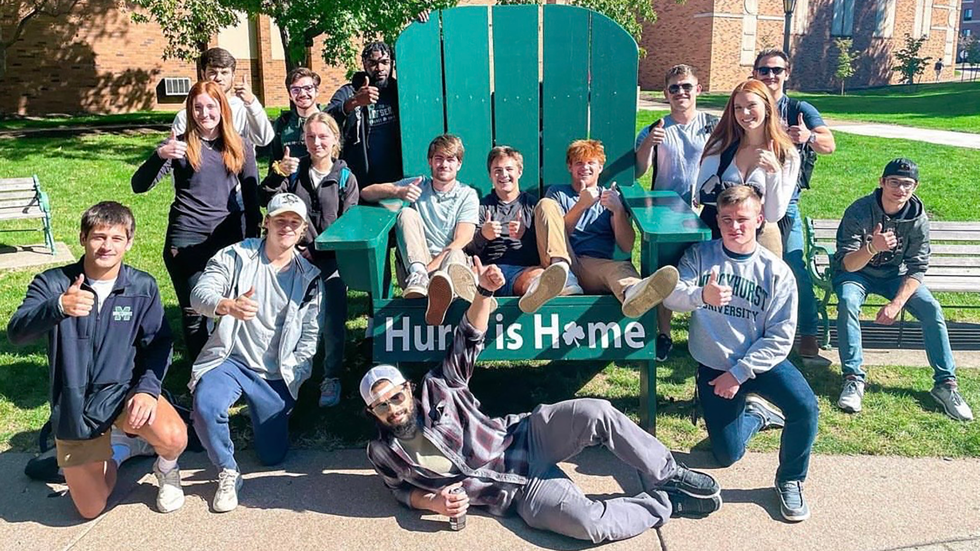 Students on Hurst is Home lawn chair