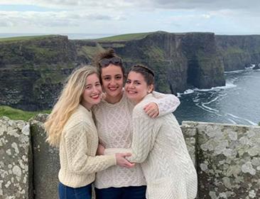 Students pose outside during study abroad