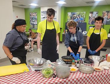 Students learning cooking