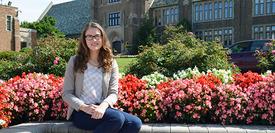 Alumni posing on campus