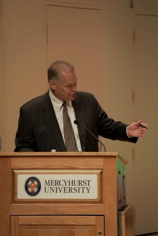 Image of Bill Hale on Mercyhurst University podium