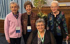 Alumni gathering in Mercy Heritage Room