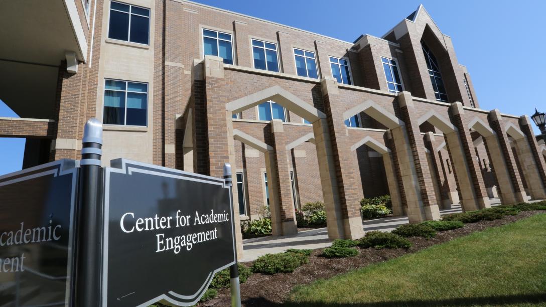 center for academic engagement outside with sign