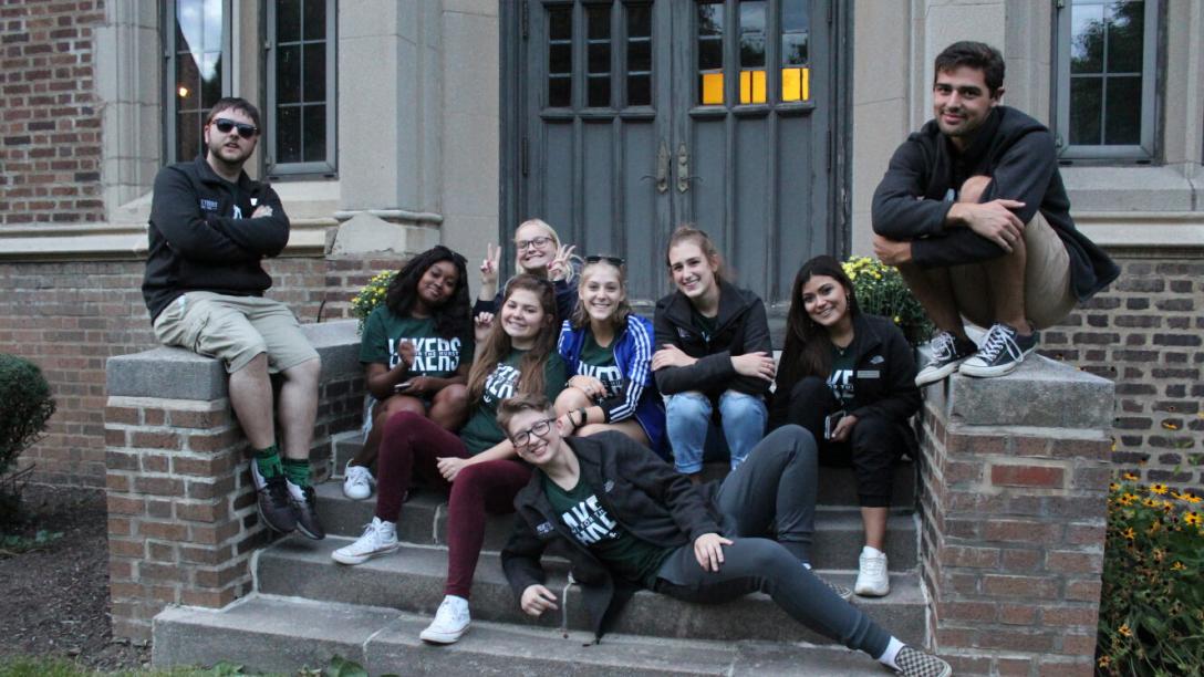 Students gathered on stairs awaiting homecoming festivities