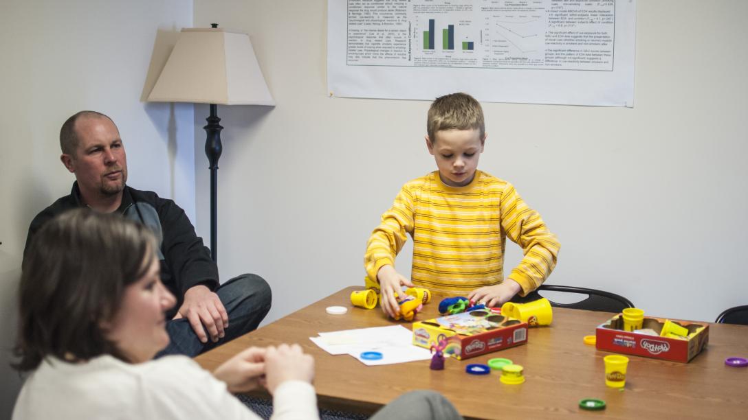Patient interacting with toys