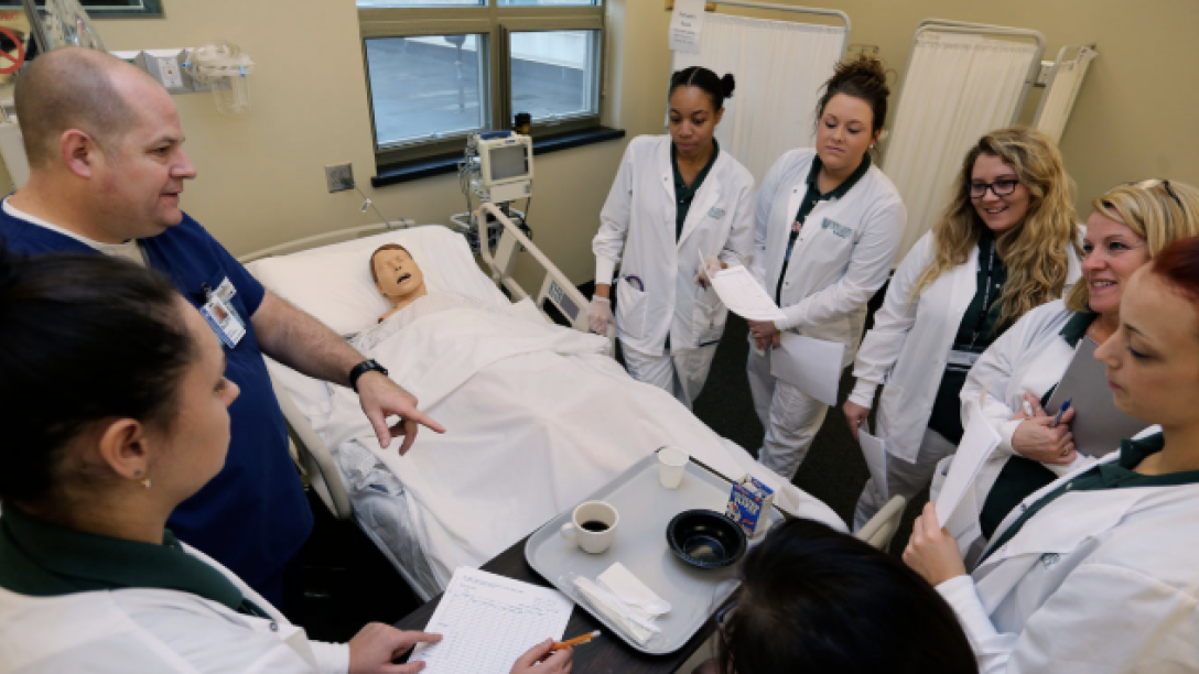 Students listening to a nursing lecture