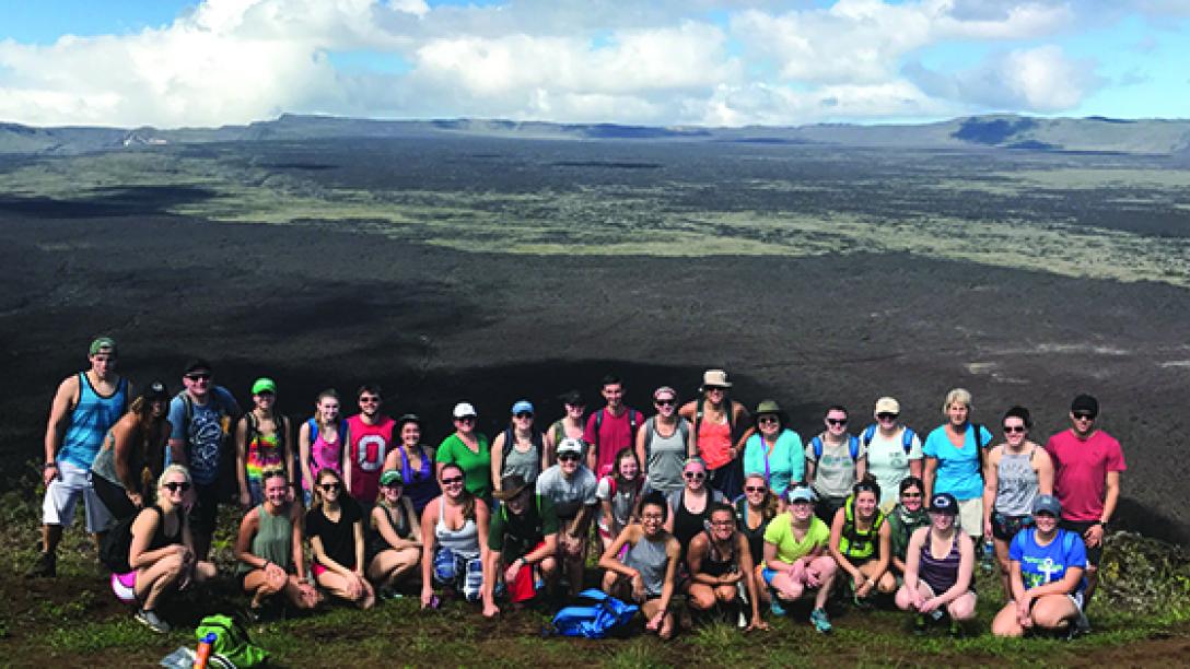 a group of students pose for a photo in the Caribbean Islands