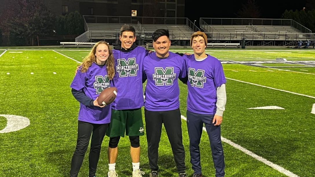 Flag football team posing for a photo