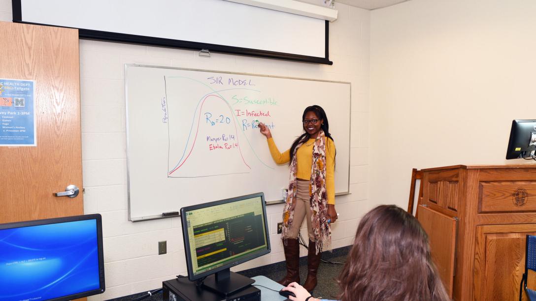 Public Health students receiving a lecture from their professor