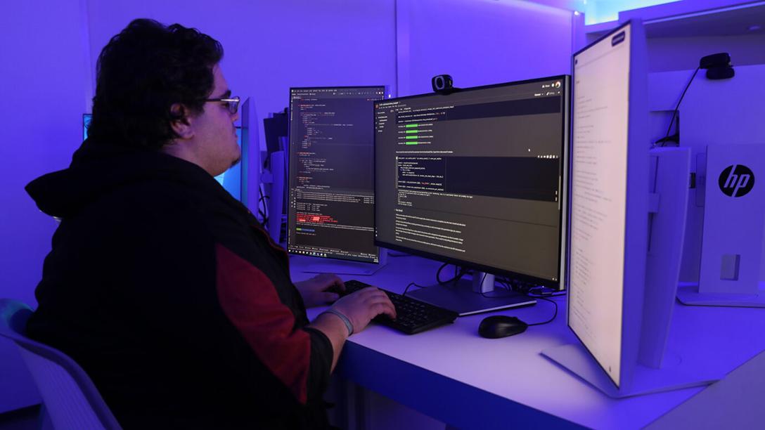 Student assessing digital information on a computer in the CIRAT lab