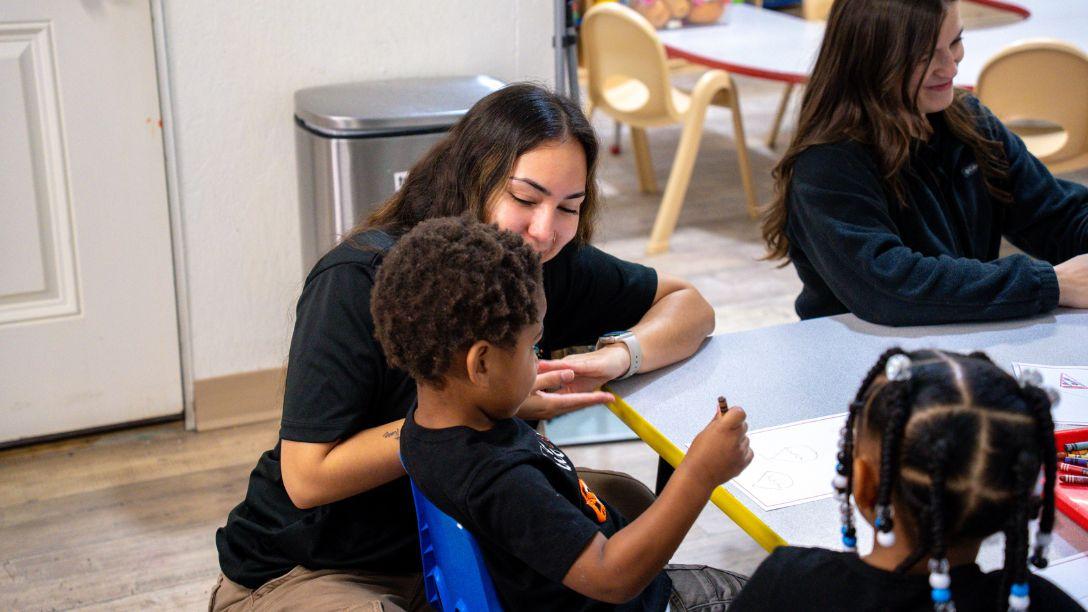 Student and child coloring