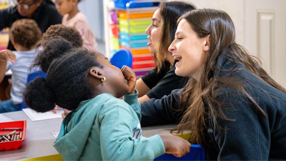 Student and child talking