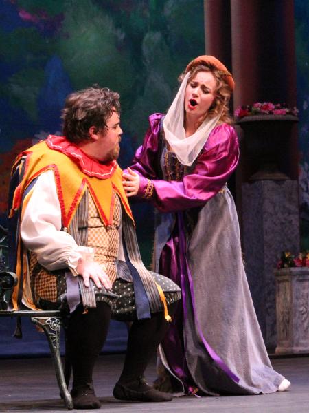 a female student sings to a male student in the opera "Rigoletto"