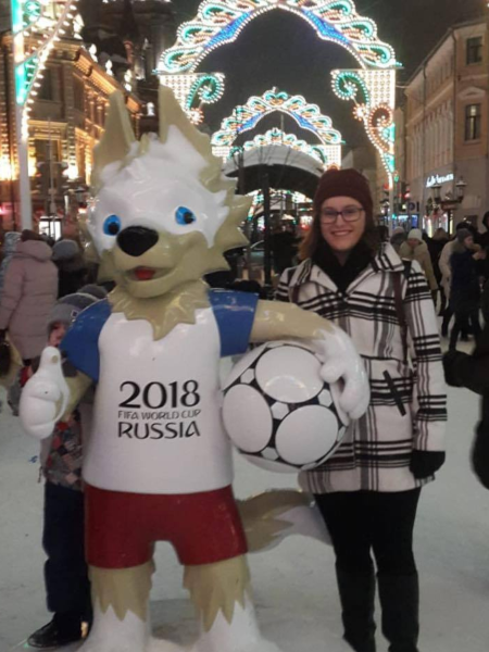 student with olympic mascot