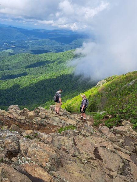 Geology students climbing mountain