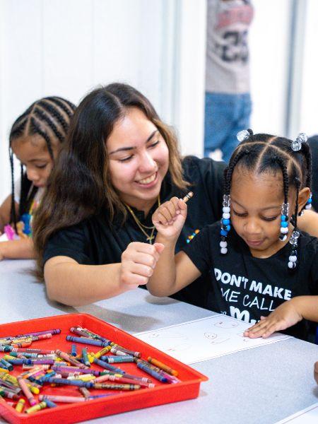 Student and child coloring