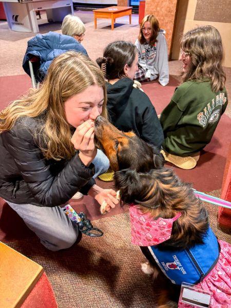Student with therapy dog