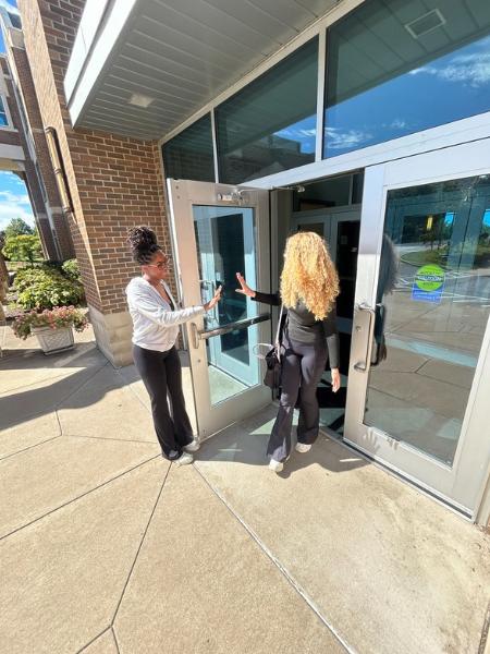 Student Opening Door